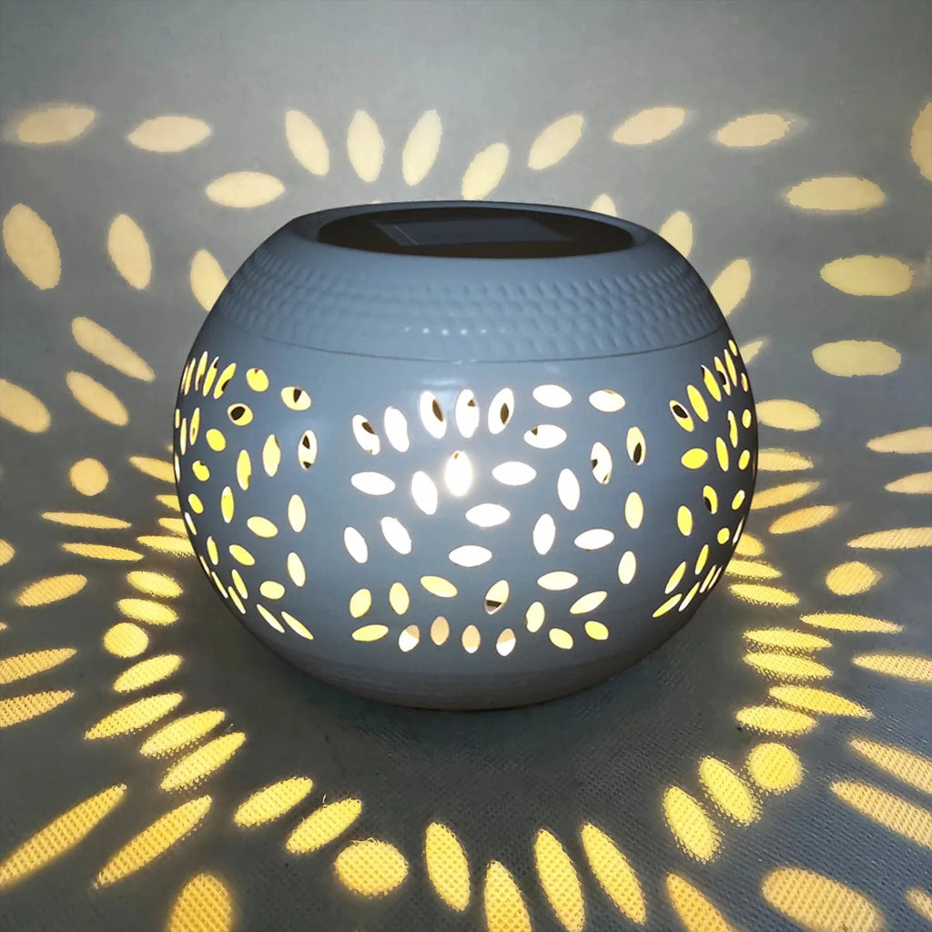 Solar desktop lamp, desktop lighting lamp, hollow metal lighting lamp, solar lamp, suitable for courtyards, gardens and lawns